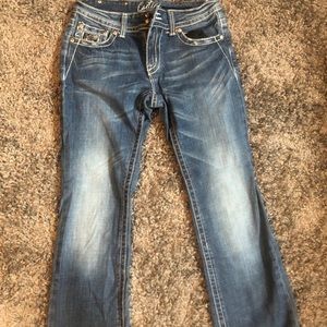 Chic Blue Boot Cut Jeans with Embellished Pockets